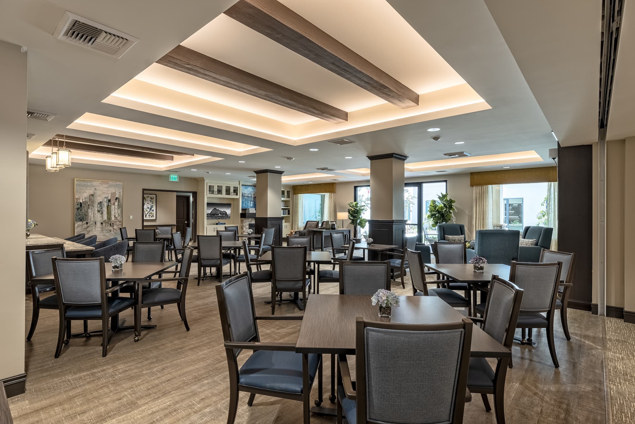 Communal dining area with ample seating and tables.